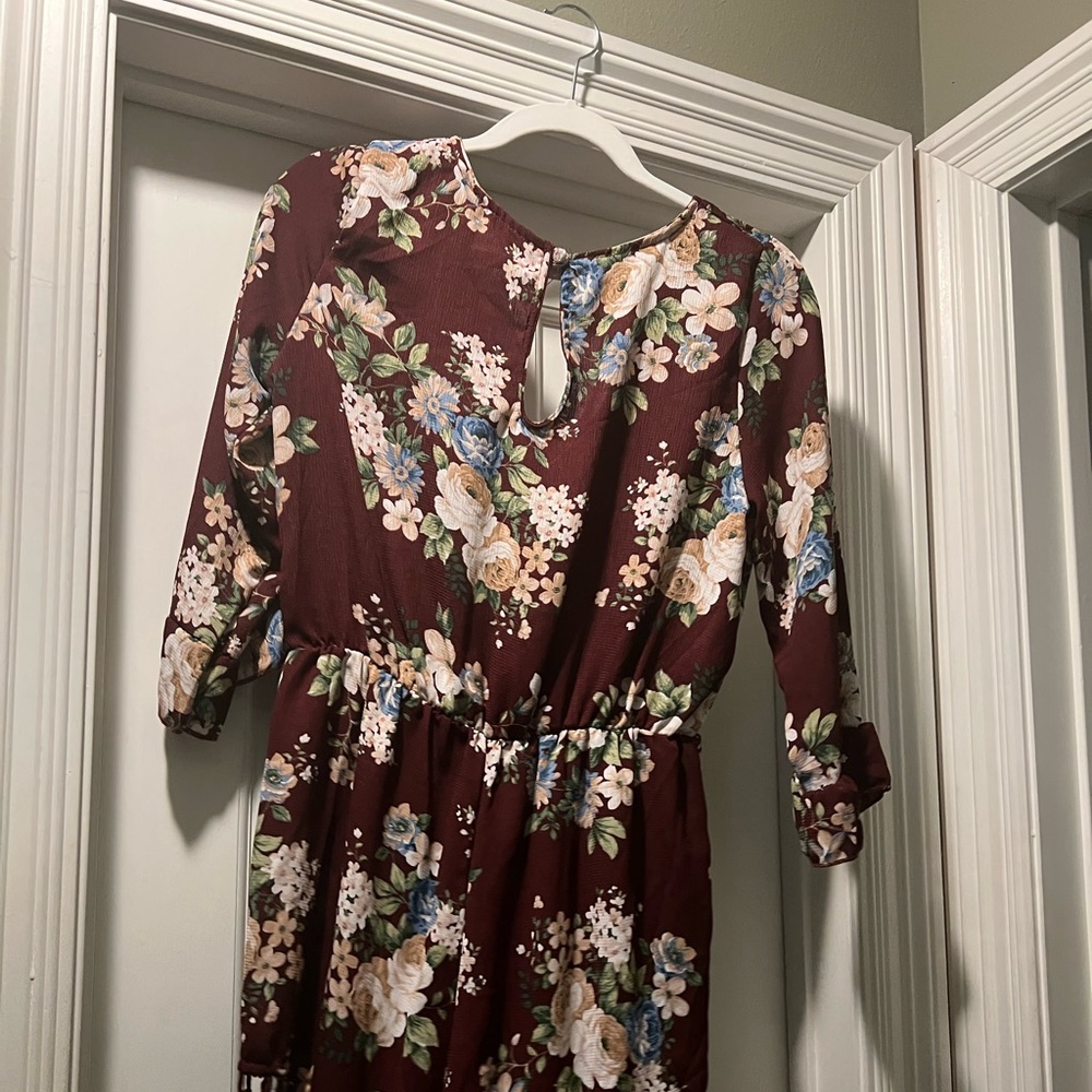 Maroon romper with flowers